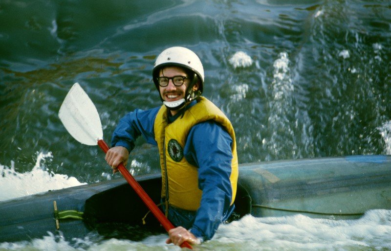 John Kobak with an early kayak, paddle, helmet, and flotation on the Rocky River in 1971